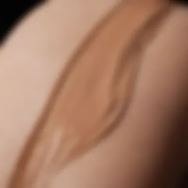 A close-up of a matte foundation swatch on skin