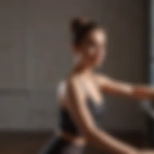 A graceful figure performing a barre exercise