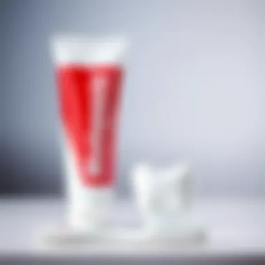 A vibrant tube of whitening toothpaste next to a sparkling clean toothbrush