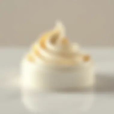 A luxurious cream mousse texture displayed on a sleek surface