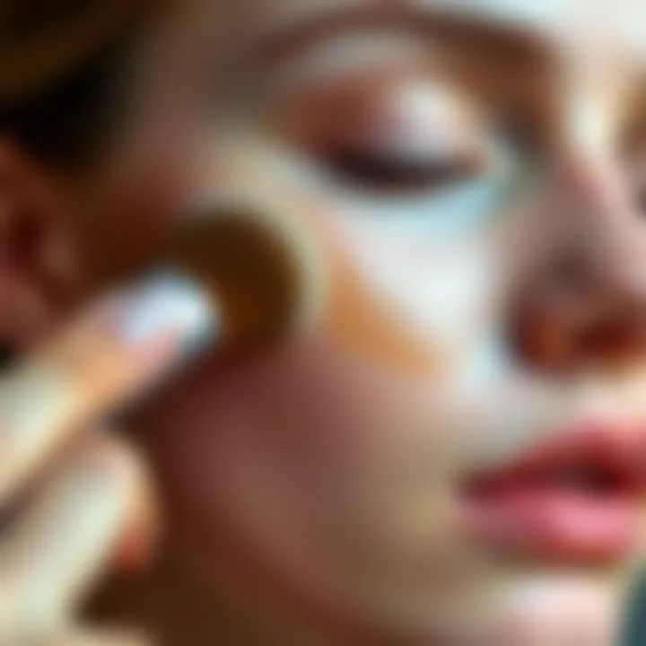 Application Technique for Flawless Finish A close-up of a hand applying foundation with a brush on a flawless skin.