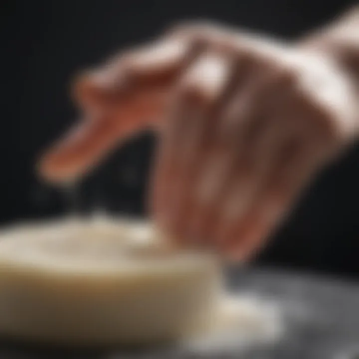 Close-up of a hand applying soap to skin, showcasing texture