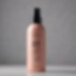 A close-up of keratin-infused dry shampoo spray bottle