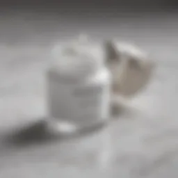 A close-up of a hydrating lotion on a marble surface.