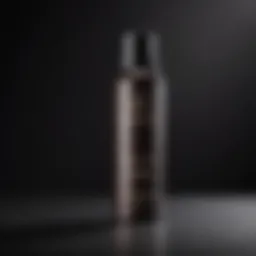 A luxurious bottle of dry shampoo designed for dark hair, featuring a sleek design.
