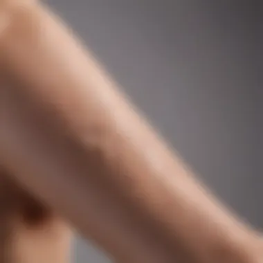 A close-up of a person applying moisturizer to their arm