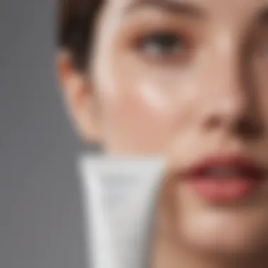 Close-up of Shiseido sunscreen tube with acne-prone skin background