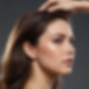 Hair stylist applying anti-frizz serum to hair ends