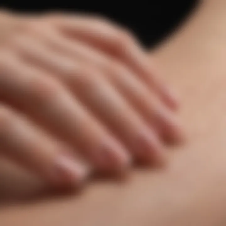 Demonstration of dip nail application technique on a nail