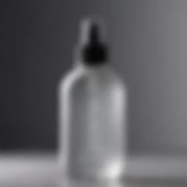 Close-up of a toner bottle with a refreshing mist being sprayed.