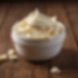Natural shea butter spread on a wooden surface