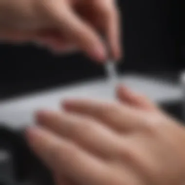 Professional nail technician demonstrating gel polish removal technique