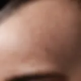 Close-up view of scalp with visible pimples